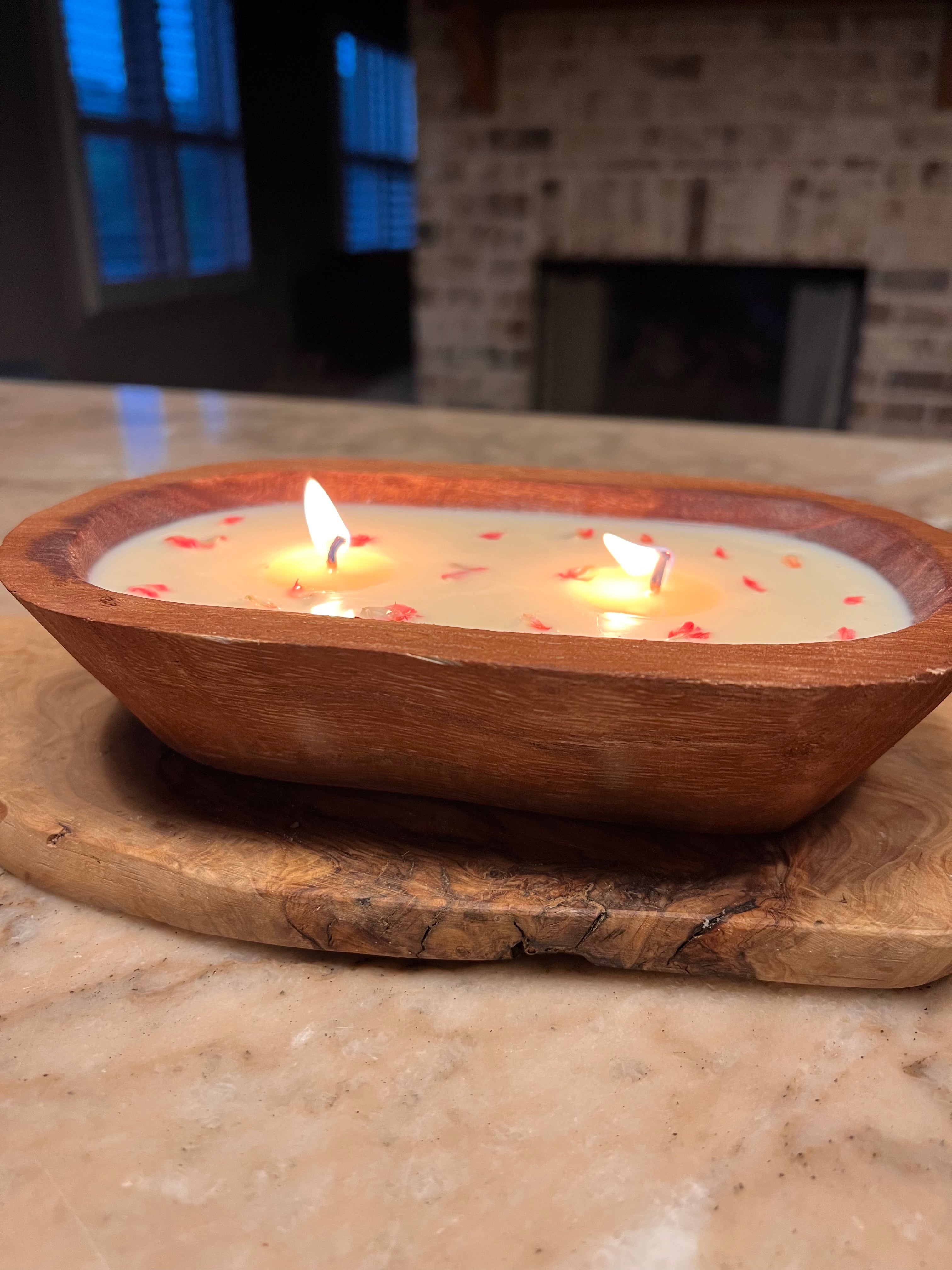 Candle in a wooden bowl